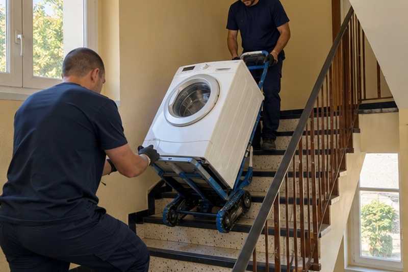 Lave-linge sur diable monte-escalier : chantier Rue Athanase Housset